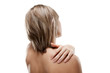 Woman massaging pain back isolated on white Woman massaging pain back isolated on white