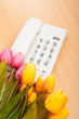 Romantic concept with phone and tulip flowers Romantic concept with phone and tulip flowers