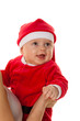 Kleines Baby als Weihnachtsmann