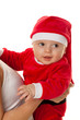 Kleines Baby als Weihnachtsmann