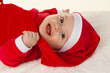 Foto: Kleines Baby als Weihnachtsmann Kleines Baby als Weihnachtsmann