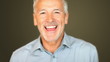 Closeup of cheerful mature man laughing