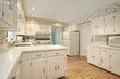 Kitchen with white counters