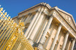 Palace facade and golden gate in Versailles