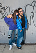 Young couple urban fashion standing portrait
