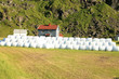 Uttakleiv's farm and hay bales Uttakleiv's farm and hay bales