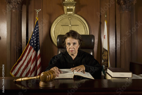 Photo: Judge sitting in court, portrait Judge sitting in court, portrait