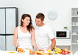 Lovely couple preparing their breakfast together