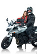Photo: Bikers couple in leather jackets with white motorcycle Bikers couple in leather jackets with white motorcycle