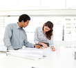 Two business people looking at a new project