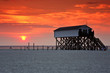 Pfahlbauten St. Peter Ording im Sonnenuntergang