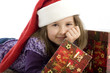 Foto: sechsjähriges Mädchen mit Weihnachtsgeschenken (mr) sechsjähriges Mädchen mit Weihnachtsgeschenken (mr)