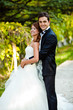 bride and groom for wedding at a park