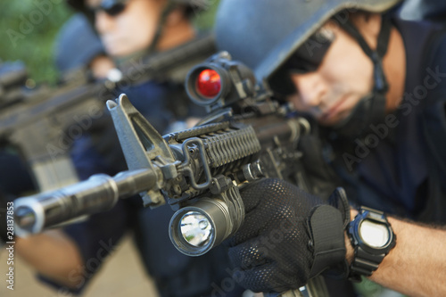 Photo: Swat officer aiming guns Swat officer aiming guns