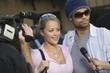 Celebrity couple being interviewed by the media