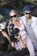 Celebrity couple being interviewed by the media