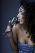 Foto: Girl with makeup, with a fish in a glass in her hand Girl with makeup, with a fish in a glass in her hand