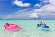 Children playing in ocean