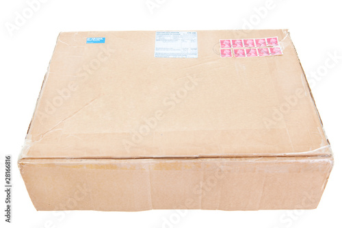 Photo: Cardboard Box Shipped Internationally From the UK, Stamps Cardboard Box Shipped Internationally From the UK, Stamps
