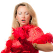 Woman dancing in red cheongsam with boa in hands