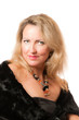 Attractive blond woman with big necklace around her neck