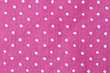 Pink  and white dots fabric background
