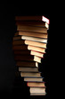 Pile of books on a black background Pile of books on a black background