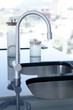 black kitchen stove curved silver stailess sink