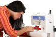 Seamstress work on the sewing-machine Seamstress work on the sewing-machine