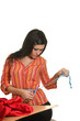 Seamstress work on the sewing-machine Seamstress work on the sewing-machine