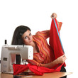 Seamstress work on the sewing-machine Seamstress work on the sewing-machine