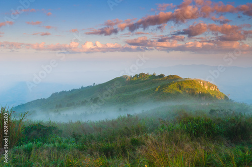 Photo: Landscape of misty mountain at sunrise Landscape of misty mountain at sunrise