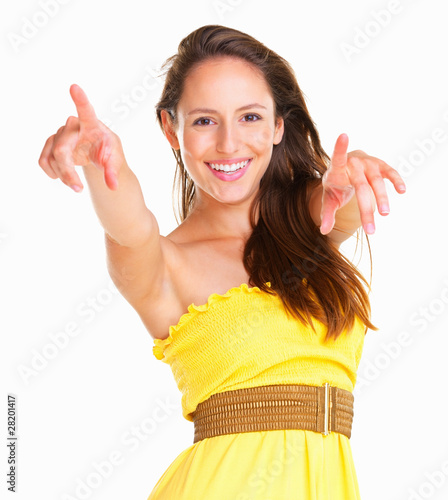 Photo: Playful woman pointing at you Playful woman pointing at you