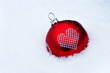 Christmas bauble in snow