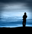 Silhouette of woman standing