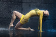 Portrait of a beautiful jazz dancer in aqua studio