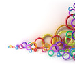 Shiny colorful circles under white wall. 3D image