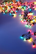Christmas lights on dark blue background with copy space. Decora Christmas lights on dark blue background with copy space. Decora