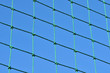 Photo: Net with blue sky on background Net with blue sky on background