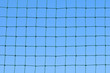 Photo: Net with blue sky on background Net with blue sky on background