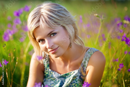 Photo: girl smiles on meadow girl smiles on meadow