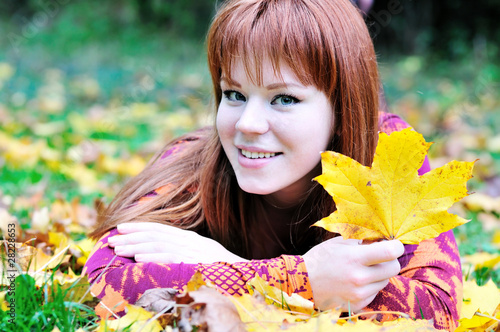 Photo: girl with leaves girl with leaves