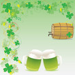 Green beer and wooden keg