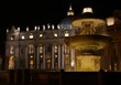 Cathedral and Fountain in Saint Peters Square at night
