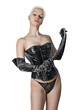 Young sexual dominatrix black with a whip in her hand.