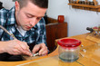 Photo: Goldsmith in workshop Goldsmith in workshop