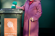 A senior woman recycling a ball of wool