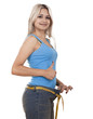 Young happy girl measuring her waist