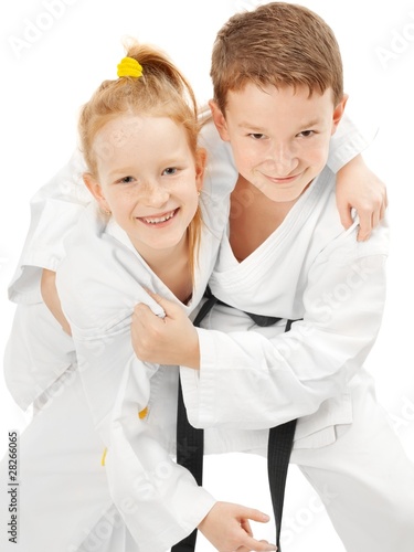 Photo: Karate boy and girl Karate boy and girl