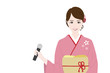 着物姿で歌う女性